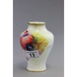 A small Royal Worcester porcelain vase; in the Autumn berry pattern; signed and painted by M.