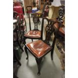 Victorian Set of five Chippendale style dining chairs; with splat back and raised on cabriole