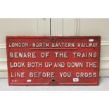 Early 20th C cast iron London North Eastern railway sign