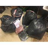 Large quantity of vintage clothing from a clothing shop closure