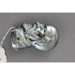 A silver plated vesta case in the form of a distinguished gentleman
