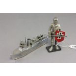 Two vintage novelty lighters to include stainless steel boat, and a knight