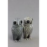 Pair of silver plated owl condiments with glass eyes