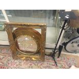 Large gilt frame, copper tray, wooden tray, another mirror and candle stick stand
