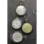 Three silver pocket watches and one other pocket watch