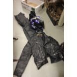 A set of motorcycle leathers & a helmet