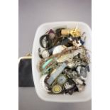 Tub of mixed collectables including badges, watches etc