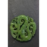 Chinese jade well carved bi depicting dragons