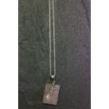 Silver and rose quartz pendant necklace on silver chain