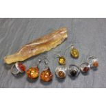 Pair of 9ct gold mounted earrings, along with a piece of amber, five rings and a pair of earrings