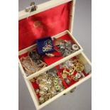 Jewellery box containing a quantity of costume jewellery to include watches and a yellow metal