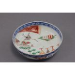 A Chinese bowl decorated with stork in flight