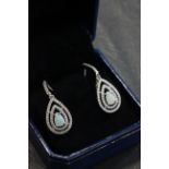 Pair of silver CZ and pear shaped opal drop earrings