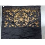 Oriental silk decorated with gilt thread work