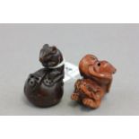 Two wooden netsuke's featuring mice