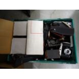 Photography slide projector in box along with a selection of antique cameras including film and cine