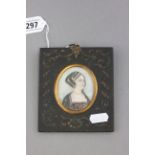 A portrait miniature of lady in a decorative frame