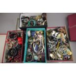 Four boxes of mixed costume jewellery