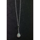 Silver and opal pendant necklace on silver chain