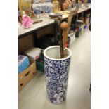A large Chinese blue and white umbrella stand