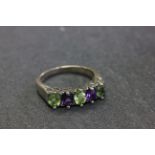 Silver peridot and amethyst five stone ring