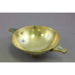 An Arts & Craft copper quaich, set with a turquoise and jade cabochon