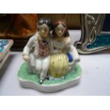 Staffordshire pottery c1850/60 two figures sitting on seat