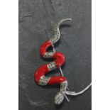 Silver marcasite and coral snake brooch