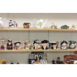 Collection of nine character jugs mainly Royal Doulton