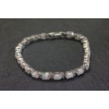 Silver CZ and opal line bracelet