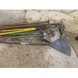 Group of garden tools to include rakes, hoes edgings tools etc