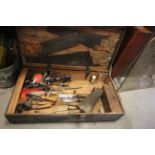 Wooden tool box trunk containing vintage tools