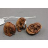 Three miniature wooden netsukes to include Cicada on leaf, mouse and monkey