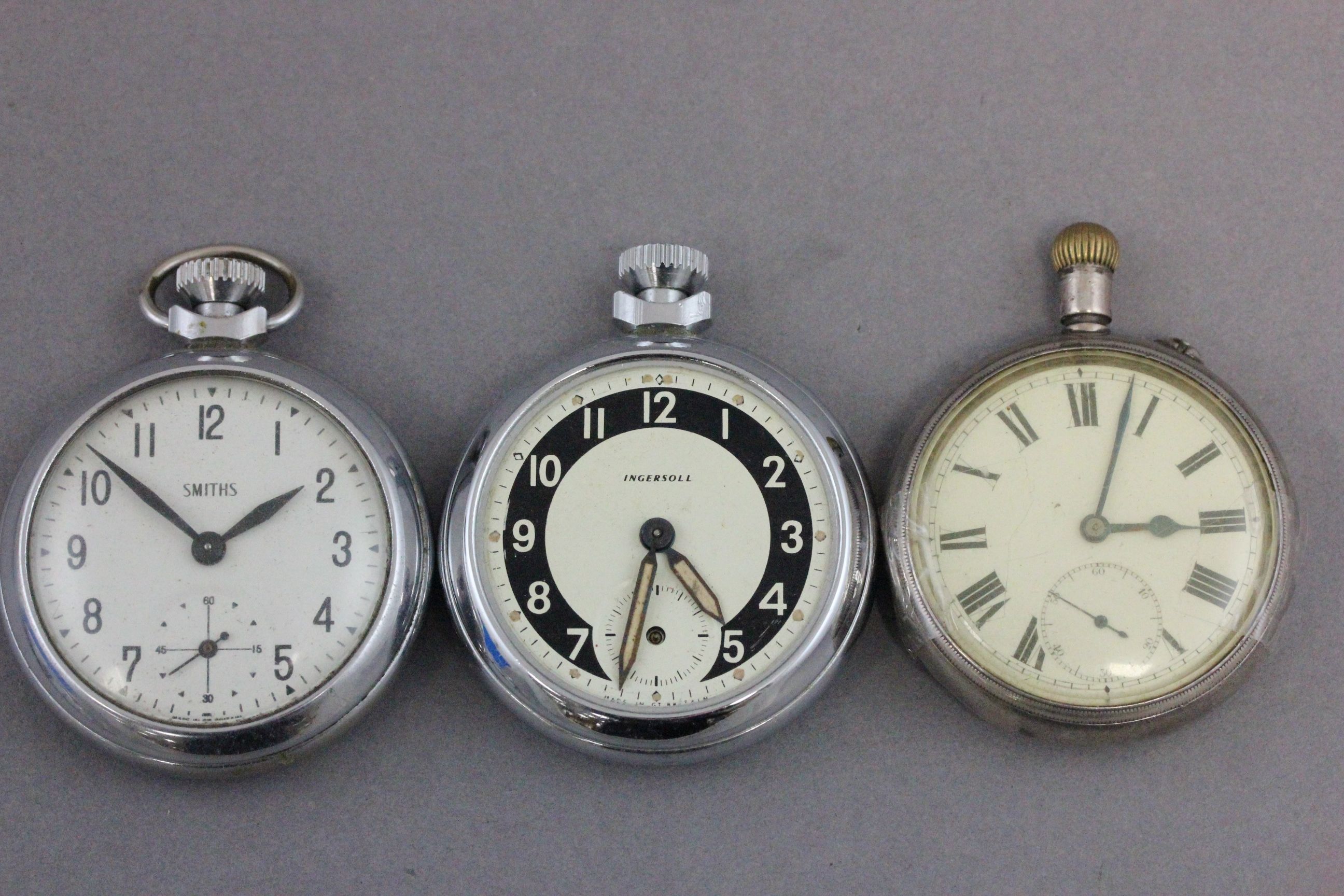 A Smiths pocket watch and two other pockets watches