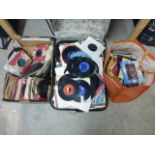 Vinyl - Large collection of 45's from 1960's onwards in suitcase box & bag