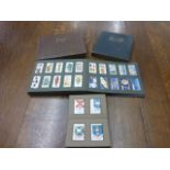 Collection of four cigarette card albums featuring sets from Wills & Players