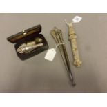 Various vintage sewing related items, including; white metal crochet hook case, silver handled