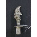 A silver sealing wax holder, the handle modelled as Mr Punch, Birmingham 1908, Robert Pringle &