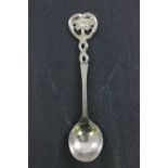 An Arts and Crafts silver spoon, with a hammered bowl and tree finial, Keswick School of