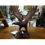 A carved wooden eagle