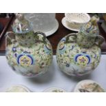 Pair of 19C unmarked continental vases, hand painted with raised tube lined detail (one with