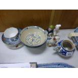 Two middle eastern blue and white bowls, along with a teapot