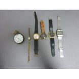 A silver pocket watch and various other watches