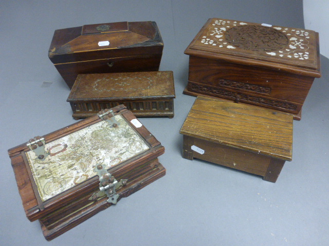 A mahogany tea caddy, along with four other boxes