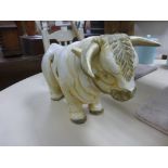 A plaster stylised Celtic bull