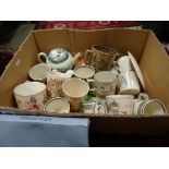 A collection of Coronation mugs, along with many 19th century examples, cider mugs and other items