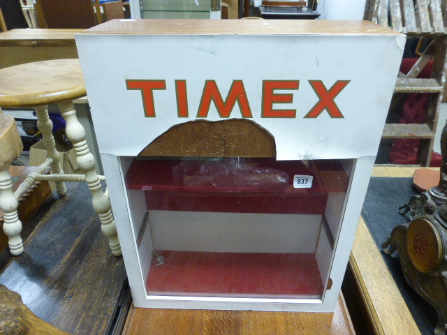 A Timex watch shop display cabinet
