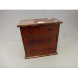 A 20th century mahogany apprentice chest of drawers