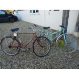 A Raleigh three speed cycle and Peugeot vintage road cycle ten speed