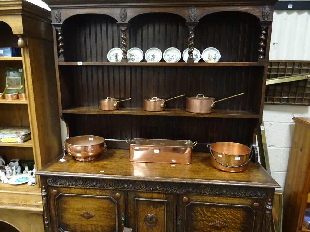 A large 20th Century oak dresser on barley twist support legs